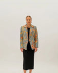 Front view of Kirrikin Dry Country Jacket featuring bold Australian bush artwork by Sheryl Hicks