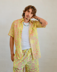 Lightweight and breathable men's resort-style short sleeve shirt in the Honey Ants pattern by artist Sally White.