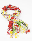 Kirrikin Blooming Sturt Peas luxury cashmere scarf flat lay featuring vibrant red and orange First Nations botanical artwork by Sally White.