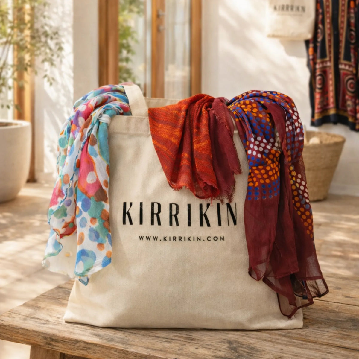 Close-up of the Kirrikin tote bag showing durable fabric texture, sturdy handles, and intricate First Nations graphic design.