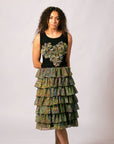 Front view of model wearing the black Lauren Heart Top featuring Lena Andrews artwork set with a tiered ruffle skirt.