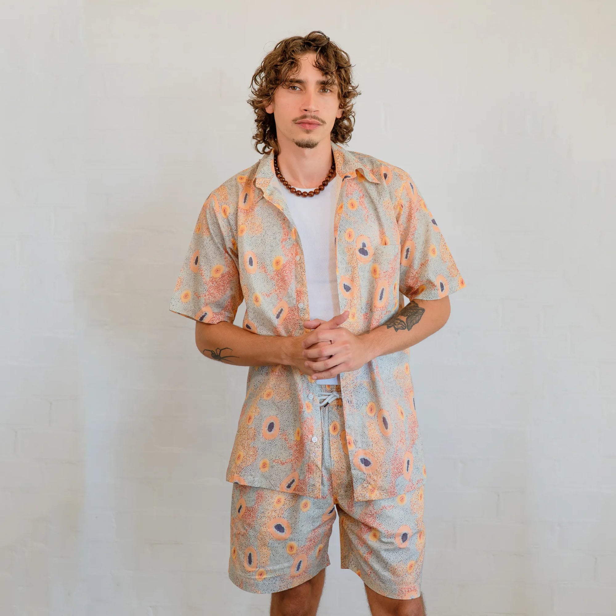 Kirrikin Men's Dry Country relaxed fit board shorts with authentic Aboriginal art print for summer wear.