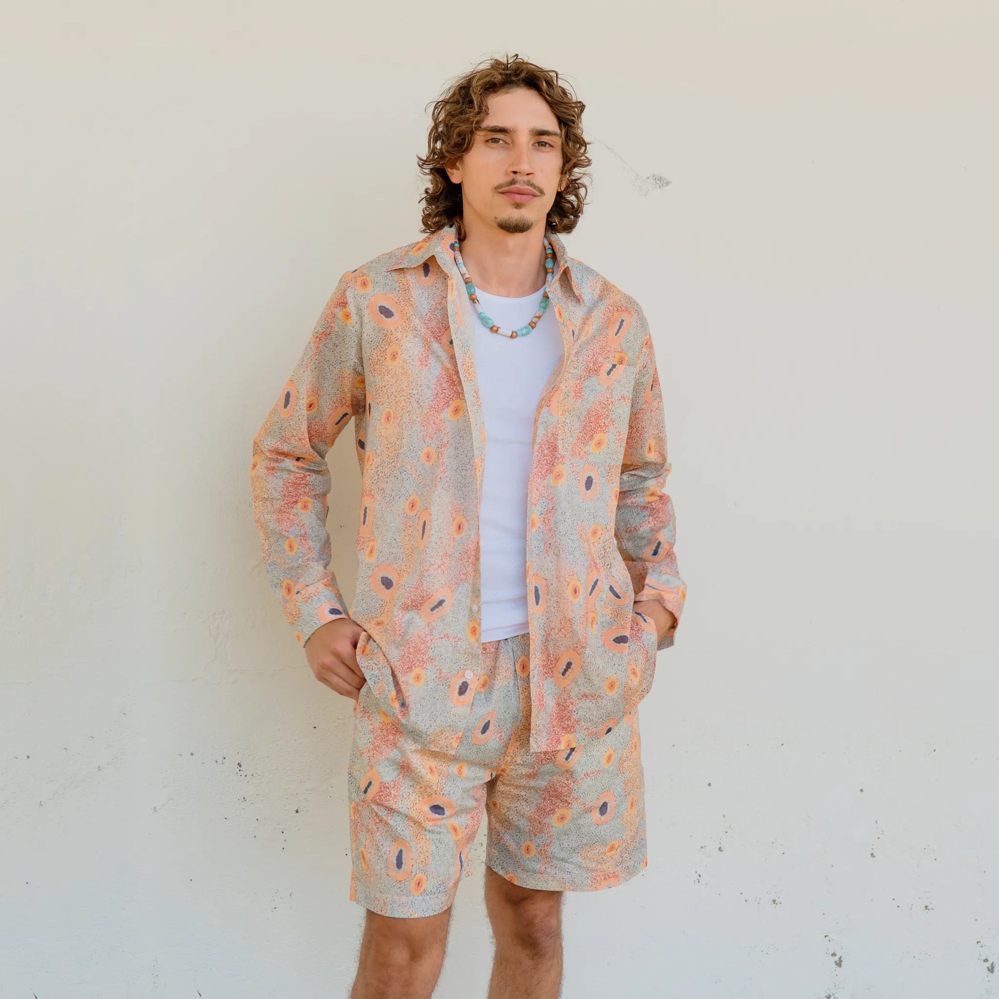 Lightweight and breathable men's swim shorts in the Dry Country pattern by Australian artist Sheryl Hicks.
