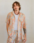 Close-up detail of Sheryl Hicks' Indigenous artwork printed on Kirrikin Men's Dry Country casual shorts.