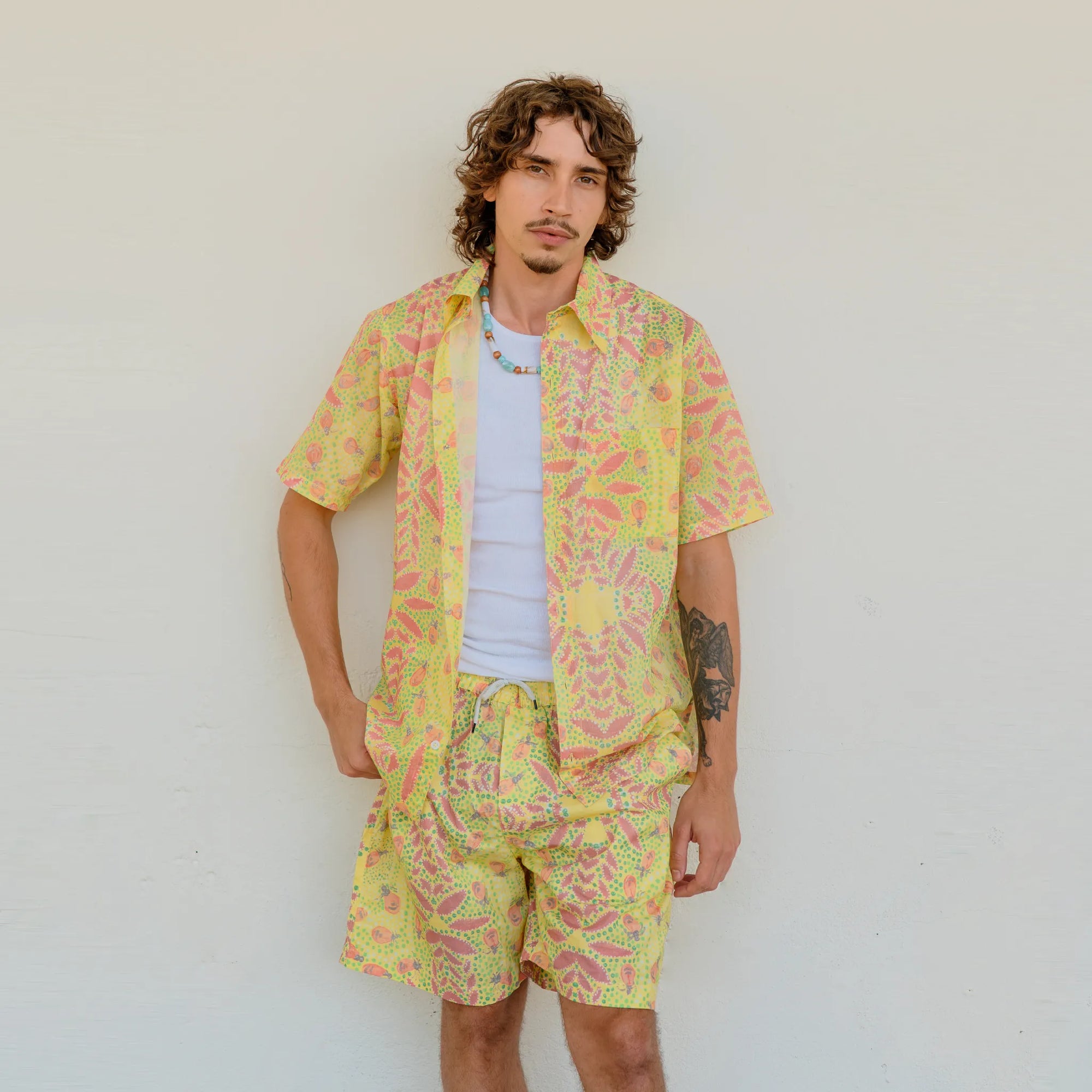 Men's Honey Ants shorts featuring authentic First Nations artwork by Sally White, designed by Kirrikin.